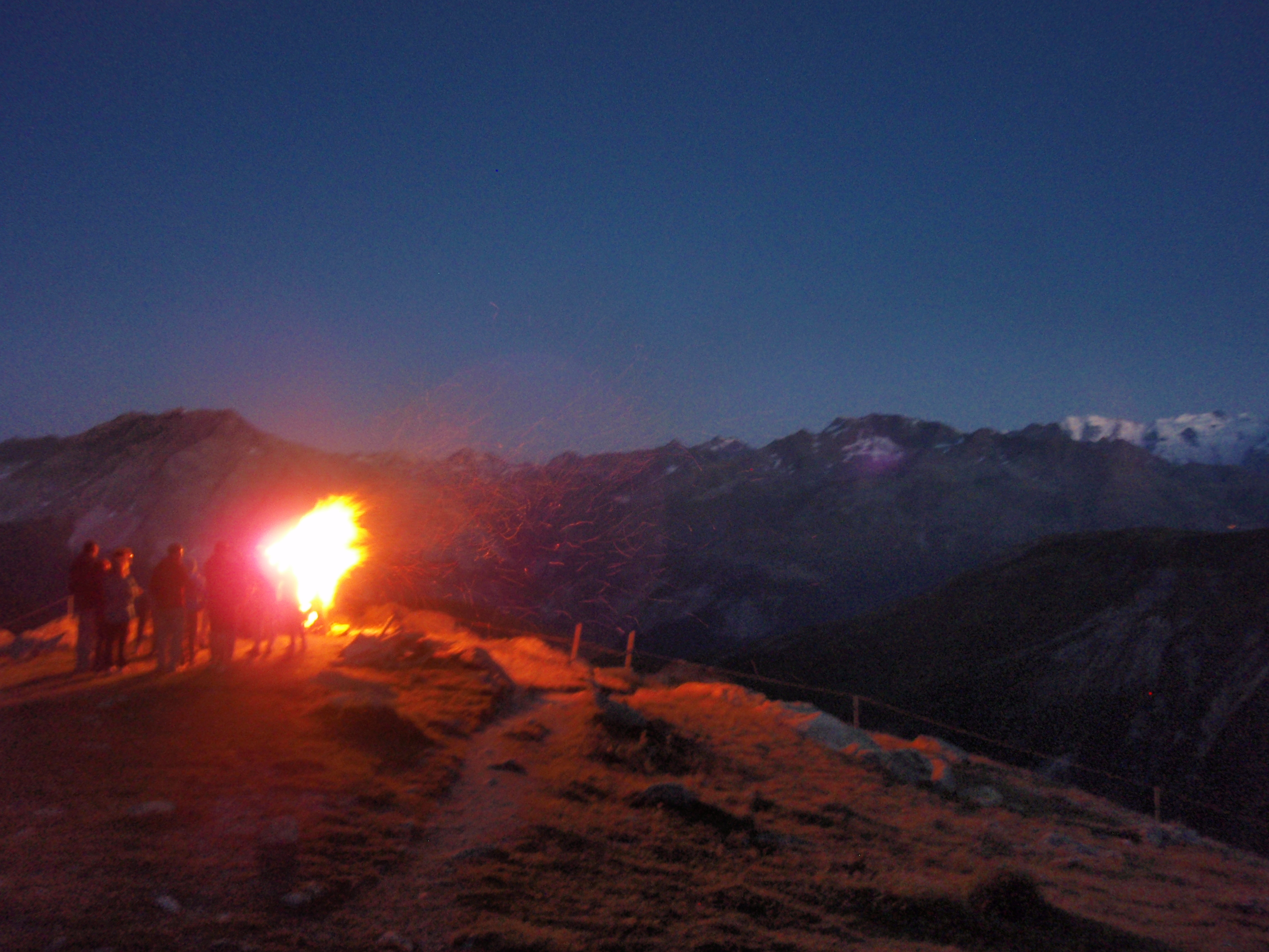 A beacon fire in the Alps